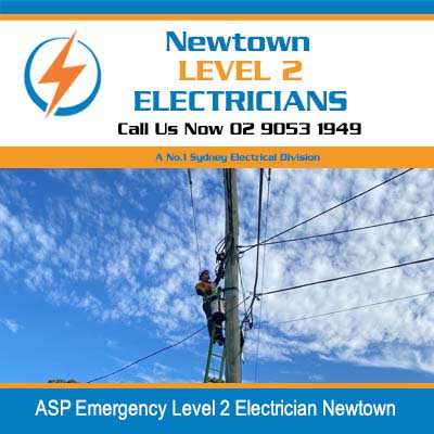 ASP emergency level 2 electrician on power pole conducting emergency electrical work on overhead lines in Newtown