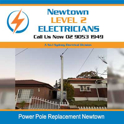 New power pole replacement at residential property with ladder positioned for connection work in Newtown